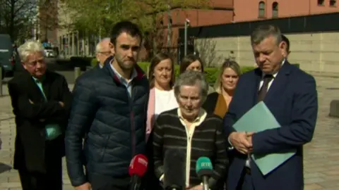 Sean Brown's family and solicitor Niall Murphy outside court