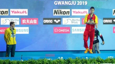 Getty Images Mack Horton refuses to join rival Sun Yang on a medal podium
