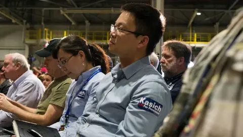 Getty Images Attendants listen to Ohio Republican Governor and presidential candidate John Kasich speaking at a Campaign Town Hall at Fuyao Glass America Inc. on March 11, 2016 in Moraine, Ohio.