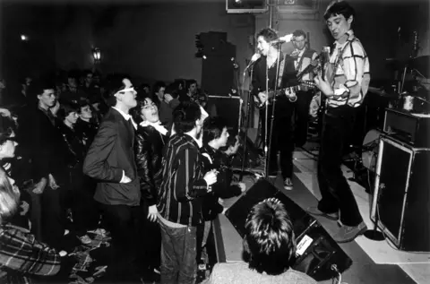 Getty Images Buzzcocks performing a small gig, circa 1977