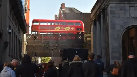 Bristol Film Office Image of a vintage double decker red bus.