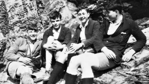 Sherborne School Archives Alan Turing (second from left) in Rock, Cornwall, in 1930 with fellow Sherborne School pupils