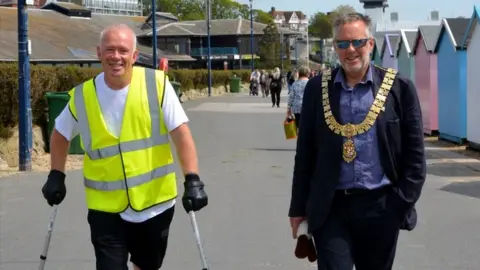 Andy Blacker Andy Blacker with a mayor on Felixstowe seafront