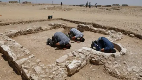 Getty Images Muslims pray at the site of an ancient mosque in Israel