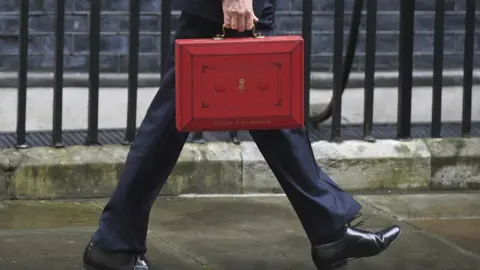PA Philip Hammond with Budget box before his March 2017 speech