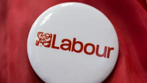 Getty Images A Labour badge