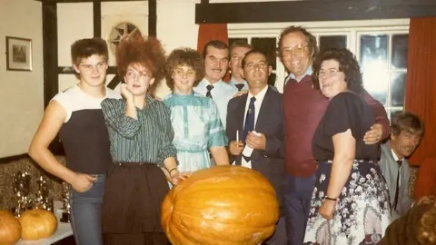 Family photo Kevin's dad Mike (second from right) with his family at a pumpkin championship in the 1980s