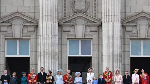 Getty Images The Queen and members of the royal family on the balcony at Buckingham Palace