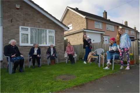 BBC (l-r) Wendy McDermott, Jean Davis, Brenda Seabrook, Chrystelle Napolitano, Leanne Pryce-Hall with baby Brooke, Louisa Hubbard and her daughter Isabelle