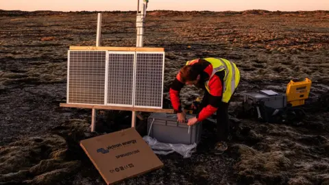 Raul Moreno/SOPA Images/Getty Images Dr Tom Winder installs a seismograph