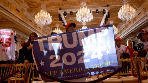 Getty Images Supporters celebrate after former US President Donald Trump's speech