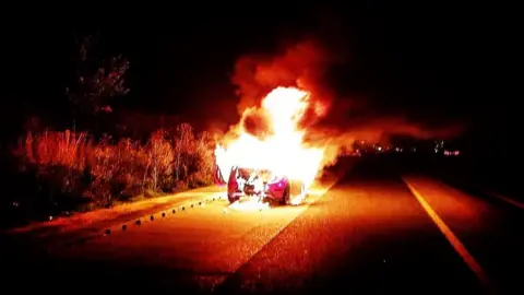 George Roberts George Roberts' car on fire