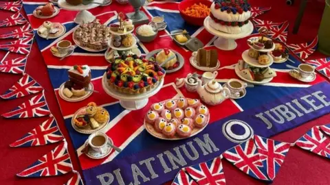 PA Media Felt art piece by Lucy Sparrow, of a Jubilee Lunch,