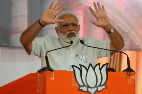 AFP Indian Prime Minister Narendra Modi gestures during a rally in Amreli, some 250km from Ahmedabad, on April 18, 2019
