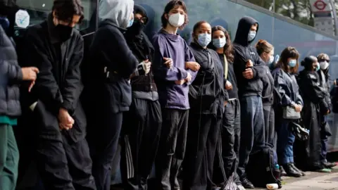 EPA Protesters surround a bus that was due to transport asylum seekers from a hotel in Peckham