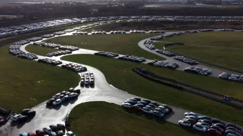 PA Media Cars stored at the Rockingham Motor Speedway circuit