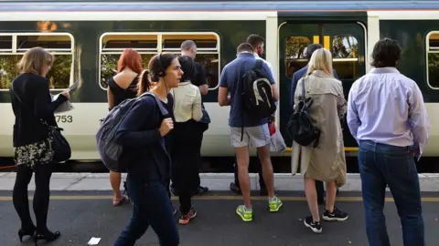 Getty Images Rail passengers