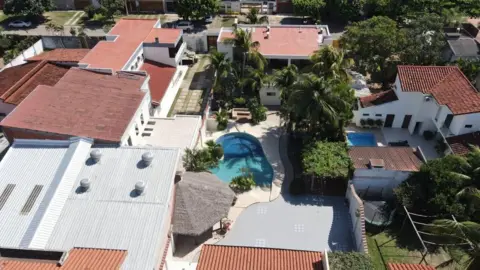 Getty Images An aerial view of a house searched by anti-narcotics police during an operation to try to arrest Uruguayan Sebastian Marset in Santa Cruz, Bolivia, taken on July 30, 2023.