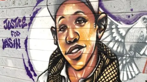 @Mathare_Roots Grafitti showing image of Yassin