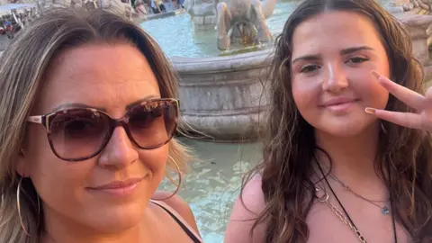 Family handout Honey and her mum, Julie Ibbitson