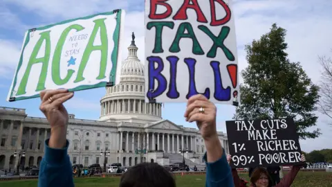 Getty Images Demonstrators join a rally against the proposed Republican tax reform legislation on the east side of the U.S. Capitol November 15, 2017 in Washington, DC.