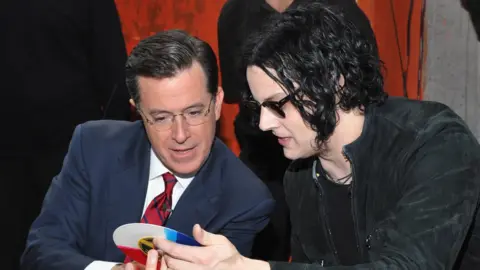 Getty Images Jack White (r) and Stephen Colbert