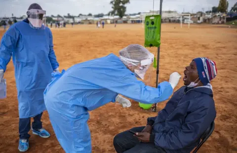 EPA Person being tested by someone in PPE