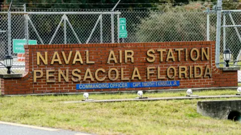 Getty Images Sign outside Pensacola Naval Air Station