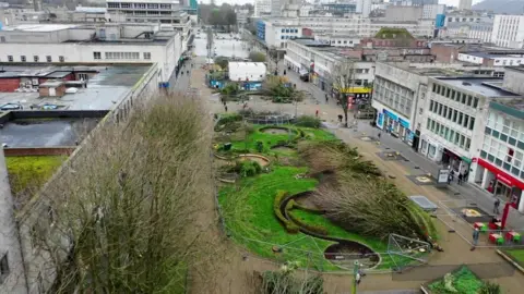 Banksy artwork creates urban tree debate, says pruning firm boss - BBC News