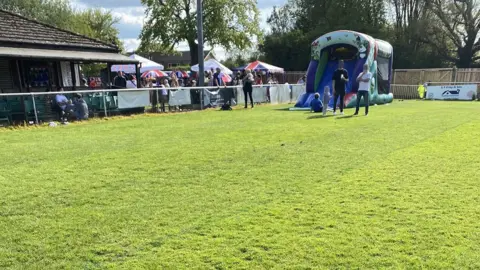 Colney Heath Ladies/PA Media Bouncy castle on pitch at Colney Heath FC