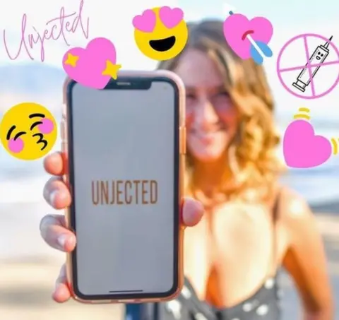 Instagram An Unjected Instagram post showing a woman on a beach holding up a mobile phone with the Unjected app on it and lots of heart emojis.