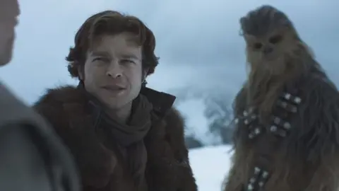 Lucasfilm Alden Ehrenreich as Han Solo, with Chewbacca