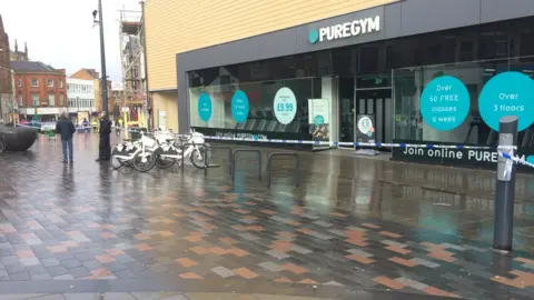 Cordon outside Pure Gym, in St Peter's Street, Derby