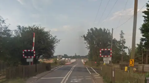 Google Norwich Road level crossing