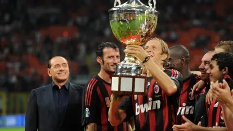 Getty Images Berlusconi with AC Milan players