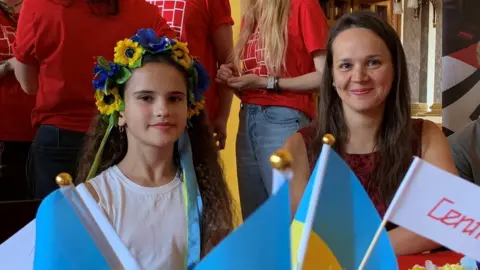 PA Media Natalia Kogut (right) and her 12-year-old daughter, Melisa Kogut,