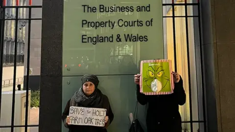 Save the Holt Farm Oak Tree Leanne Dalby and a fellow Rochford oak tree protester at the Royal Courts of Justice