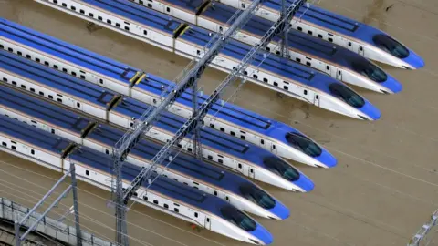 Reuters Bullet train rail yard is seen flooded due to heavy rains caused by Typhoon Hagibis in Nagano, central Japan, October 13, 2019