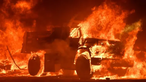 AFP A truck burns as fire ravages the Napa wine region in California on October 9, 2017, as multiple wind-driven fires continue to whip through the region