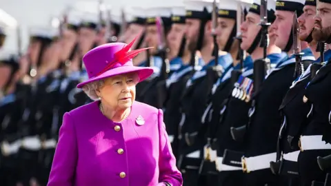 Getty Images The Queen and sailors from HMS Ocean