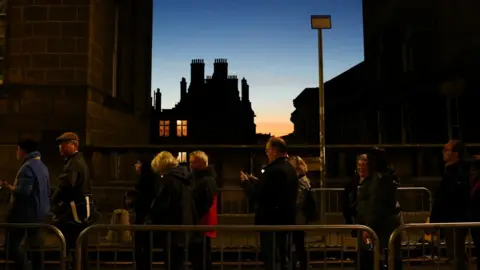 Reuters Queue to see the Queen's coffin