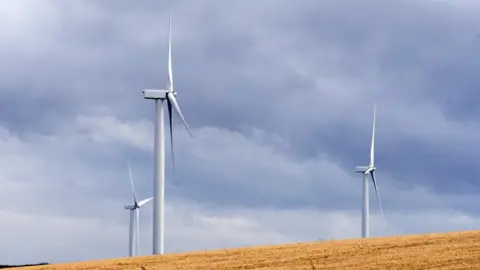 Getty Images Wind turbines