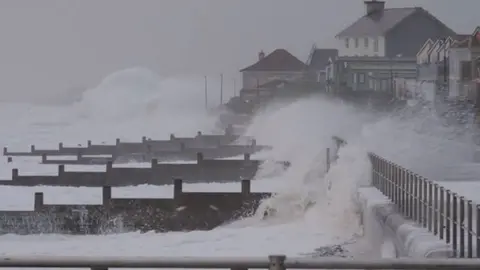 Mark Kendall A picture of waves crashing into the promenade at Gwynedd promenade