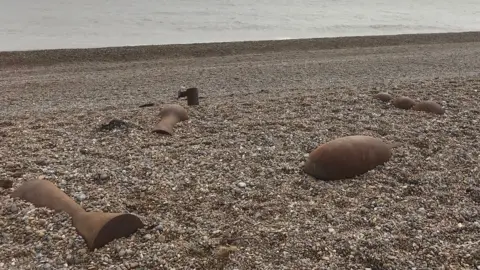 The Sir Antony Gormley sculptures at Aldeburgh beach