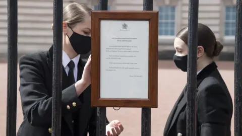 PA Media The official notice of the death of the Duke of Edinburgh is placed outside Buckingham Palace on 9 April 2021