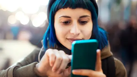 Getty Images woman on phone