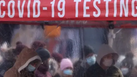 Reuters Queues in Times Square, New York, as people get tested ahead of the holiday season