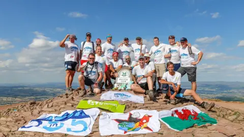 Paul Fears Group photo of the dads on Pen-Y-Fan