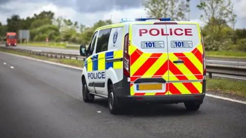 Getty Images Police van