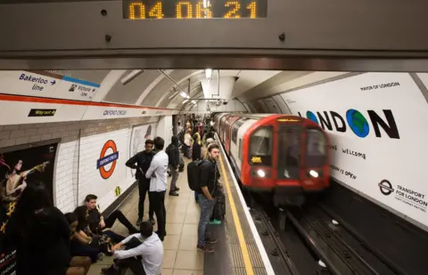 AFP/Getty Images Night Tube arrives at Oxford Circus at 0406